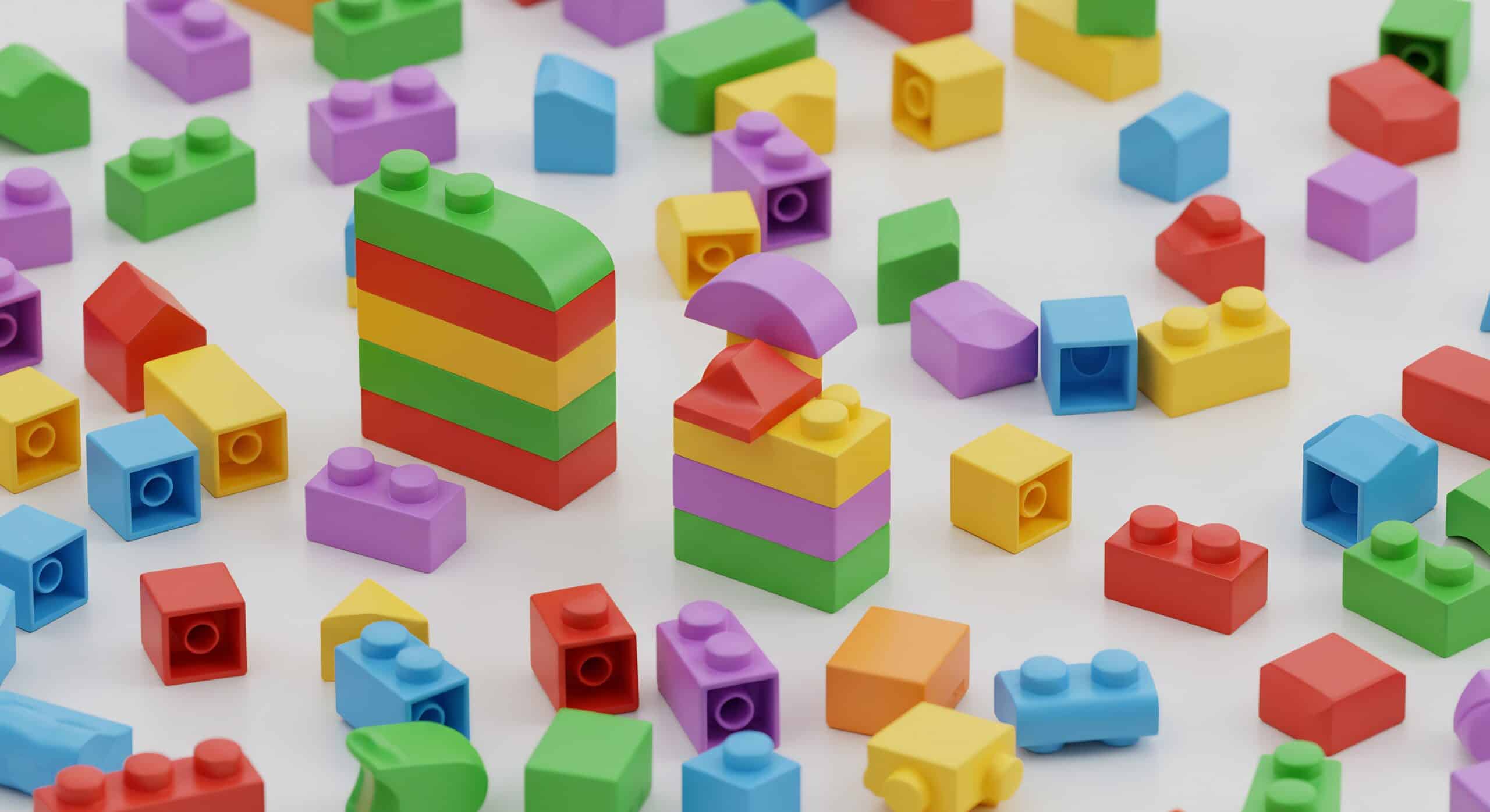 Jouets blocs couleurs vives eclatantes disperses fond blanc. AI Generated